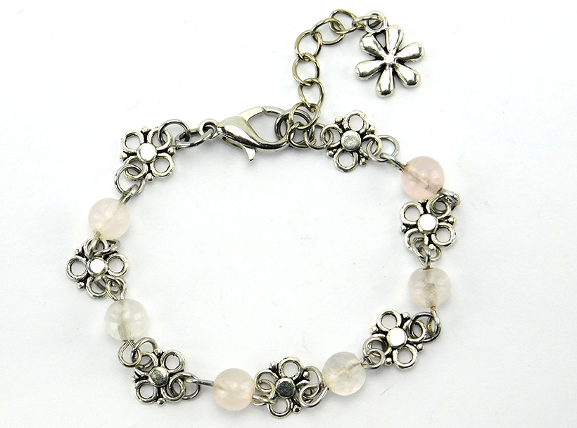 Rosenquarz Edelsteinperlen an silberfarbenem Armband