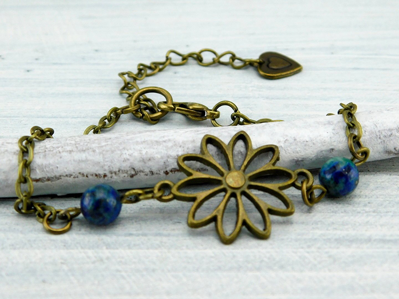 Bronzefarbenes Armband "Sonnenblume" mit blauen Perlen