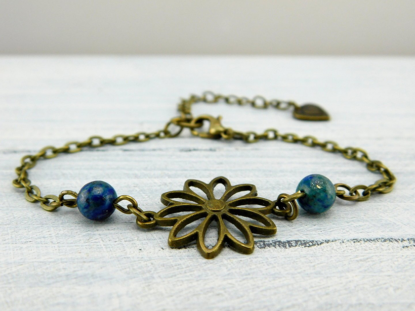 Bronzefarbenes Armband "Sonnenblume" mit blauen Perlen