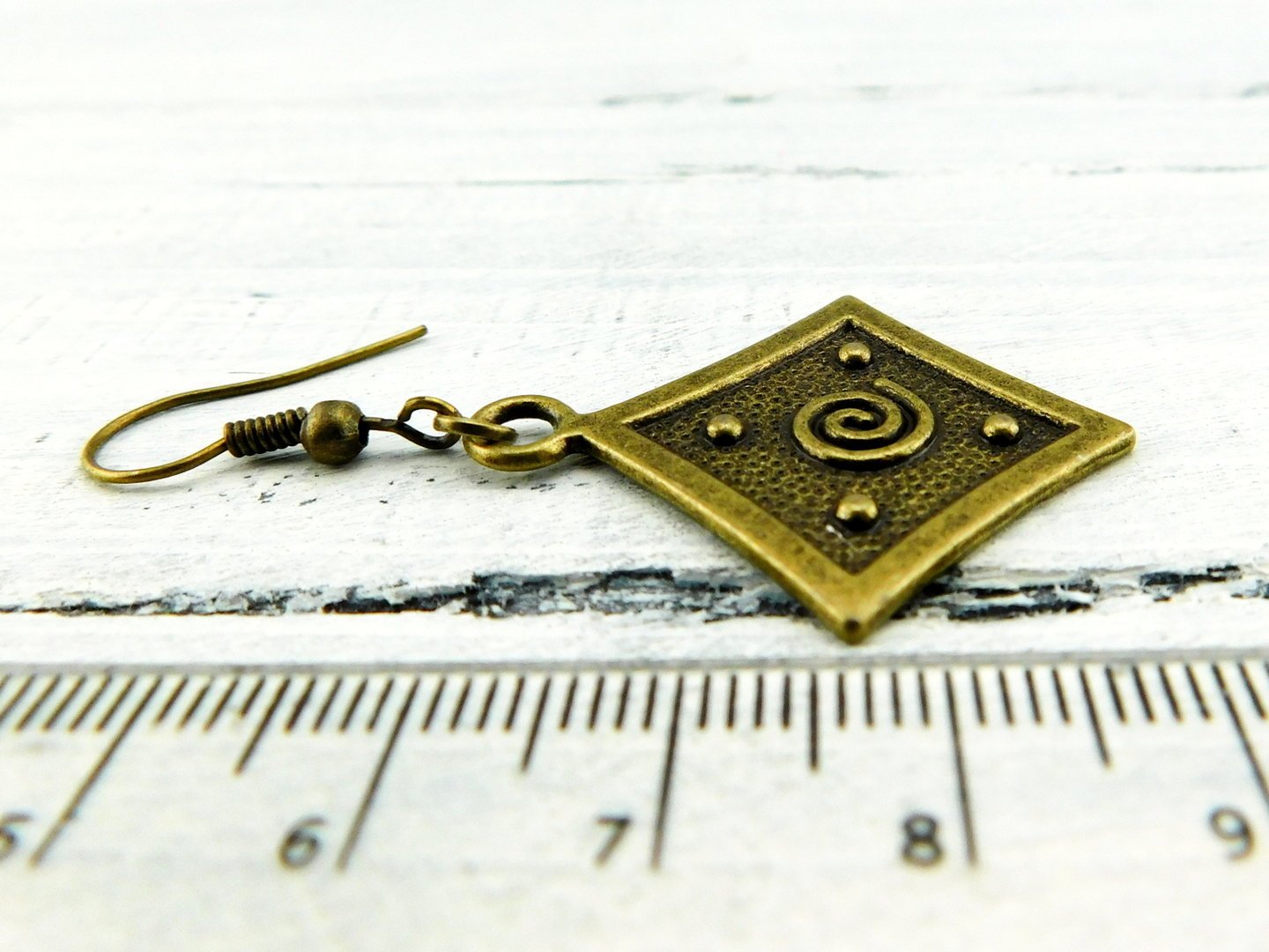 Ohrringe "Ornament" aus bronzefarbenem Metall