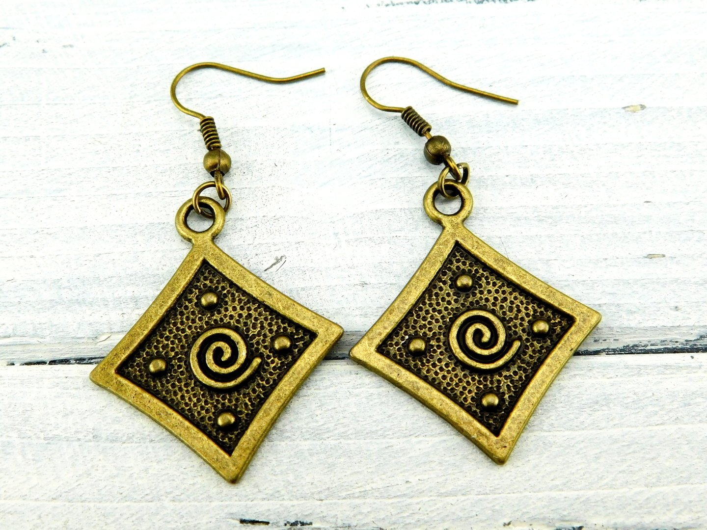 Ohrringe "Ornament" aus bronzefarbenem Metall